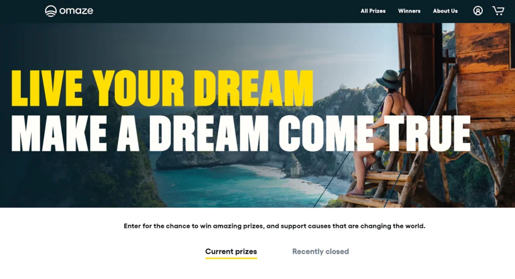 Omaze website banner with a woman sitting in a cabin overlooking the sea