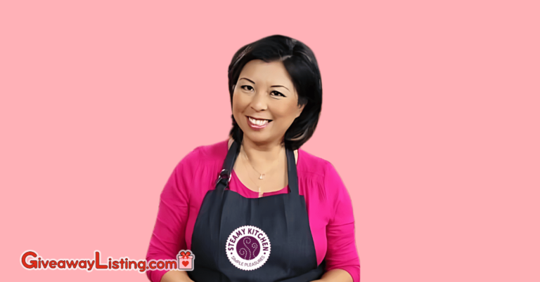 Steamy Kitchen CEO wearing an Apron with steamy kitchen logo on it.