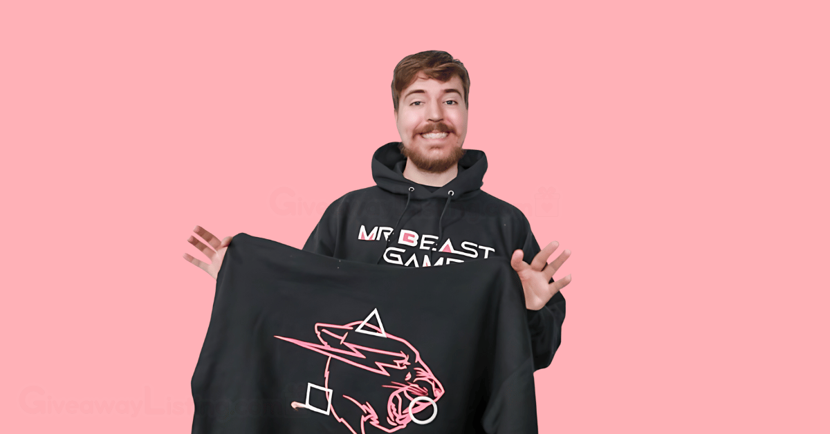 Mr Beast holding the Mr Beast Games hoodie.