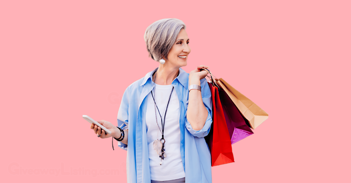 a woman holding bags of clothes