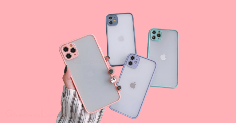 a person holding an iPhone with some other iPhones on the background.