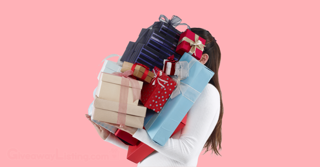 Giveaway Hub - a woman holding a a lot of gifts in pink background