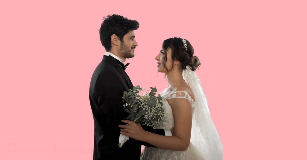 a happy couple holding each other on their wedding day.