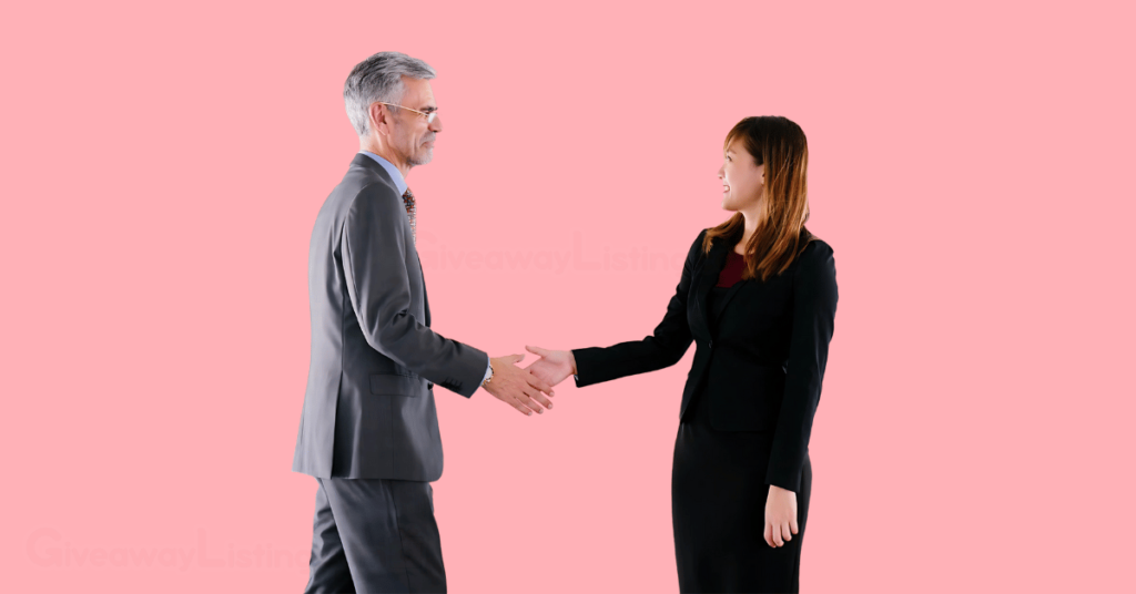 Two business partners shaking hands.