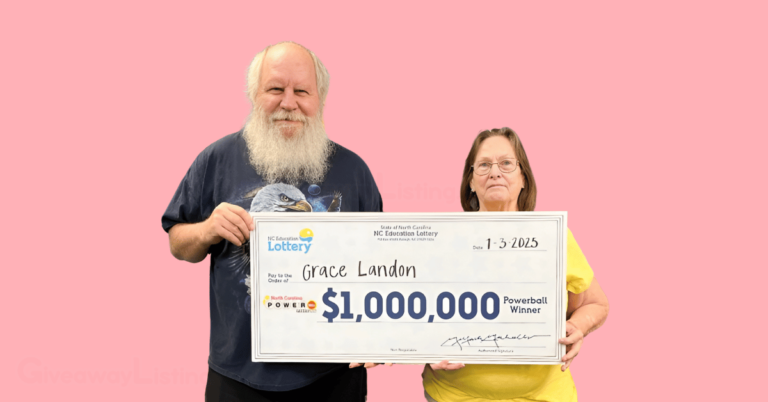 Powerball winner and her partner holding their Powerball cheque