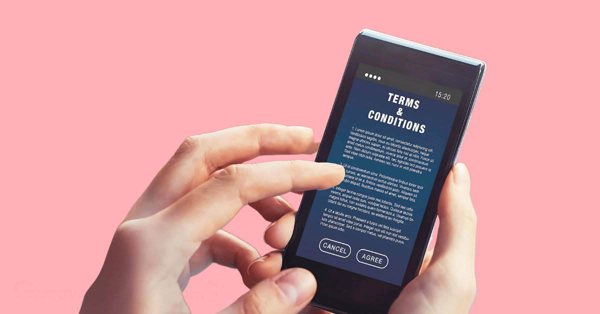 a person's hands holding and scrolling through a phone showing 'Terms and Conditions.'