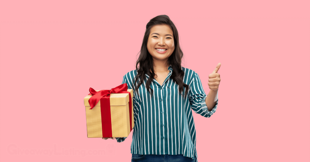 A happy woman holding a gift bag with a thumbs up.