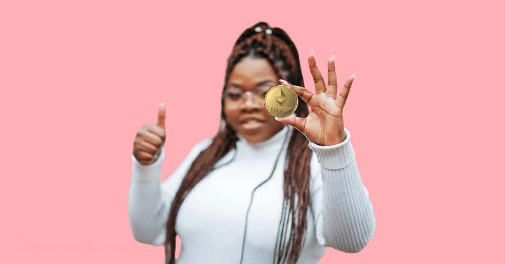 a person holding an Ethereum coin in her fingers