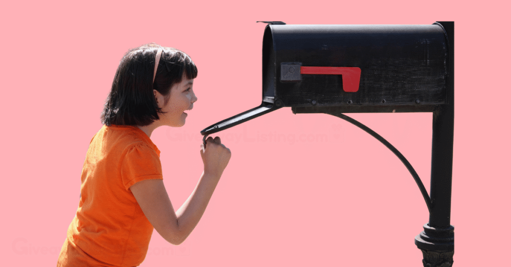 An intrigued child opening a mailbox.