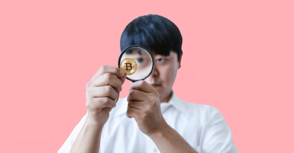 a person viewing a Bitcoin with a microscope.