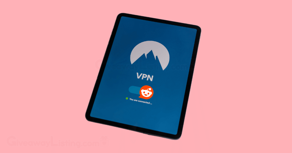 a mobile tablet with a VPN and a Reddit logo showing on the screen.