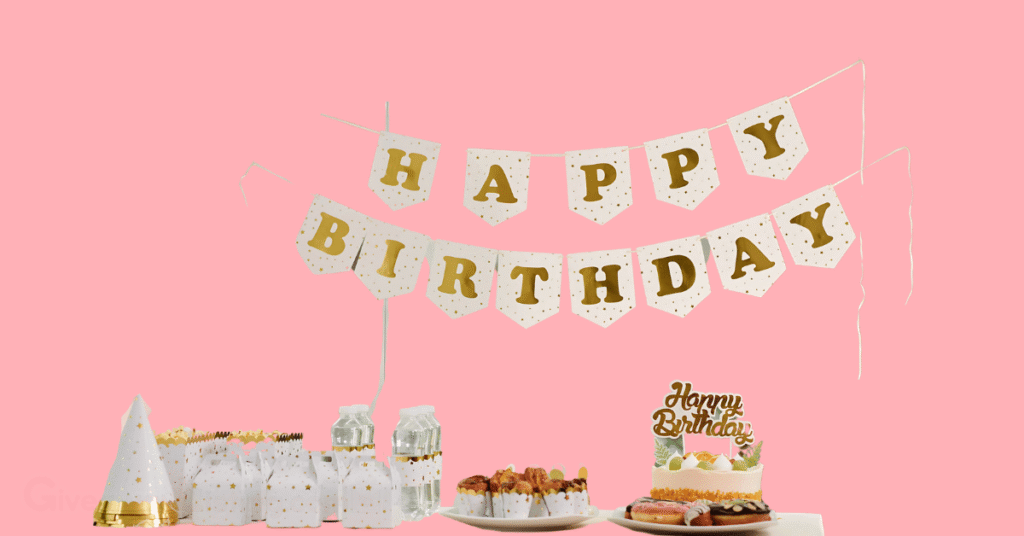 a happy birthday banner and gifts, with a birthday cake and cookies.