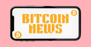 a phone with the screen showing Bitcoin news and logo.