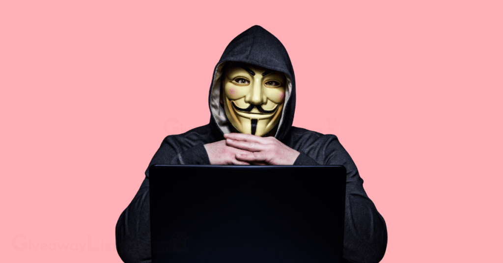 A hacker with a laptop.