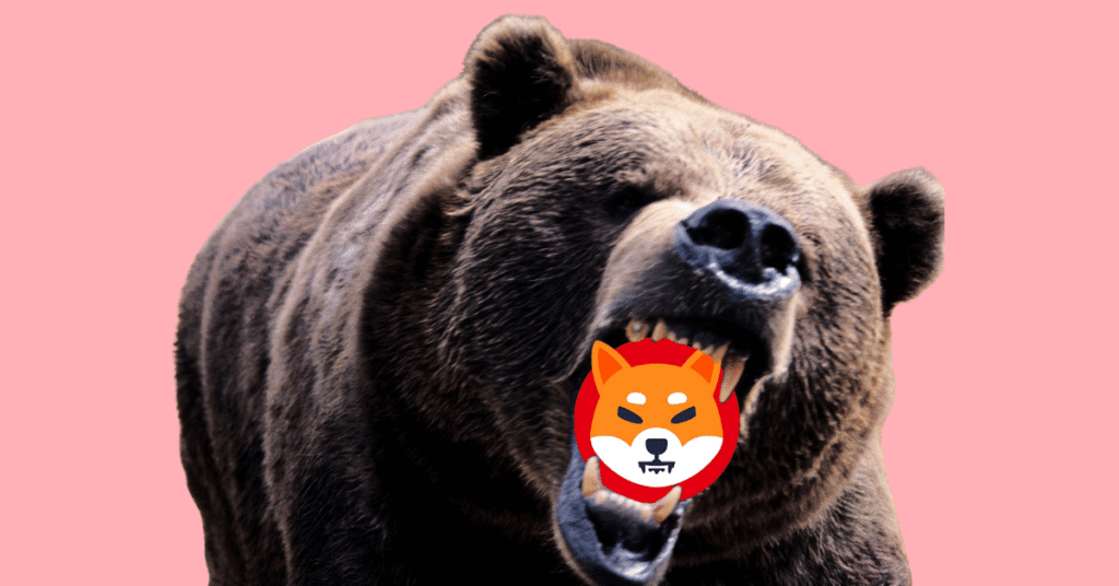 a bear with the Shiba Inu token logo clenched between its teeth.